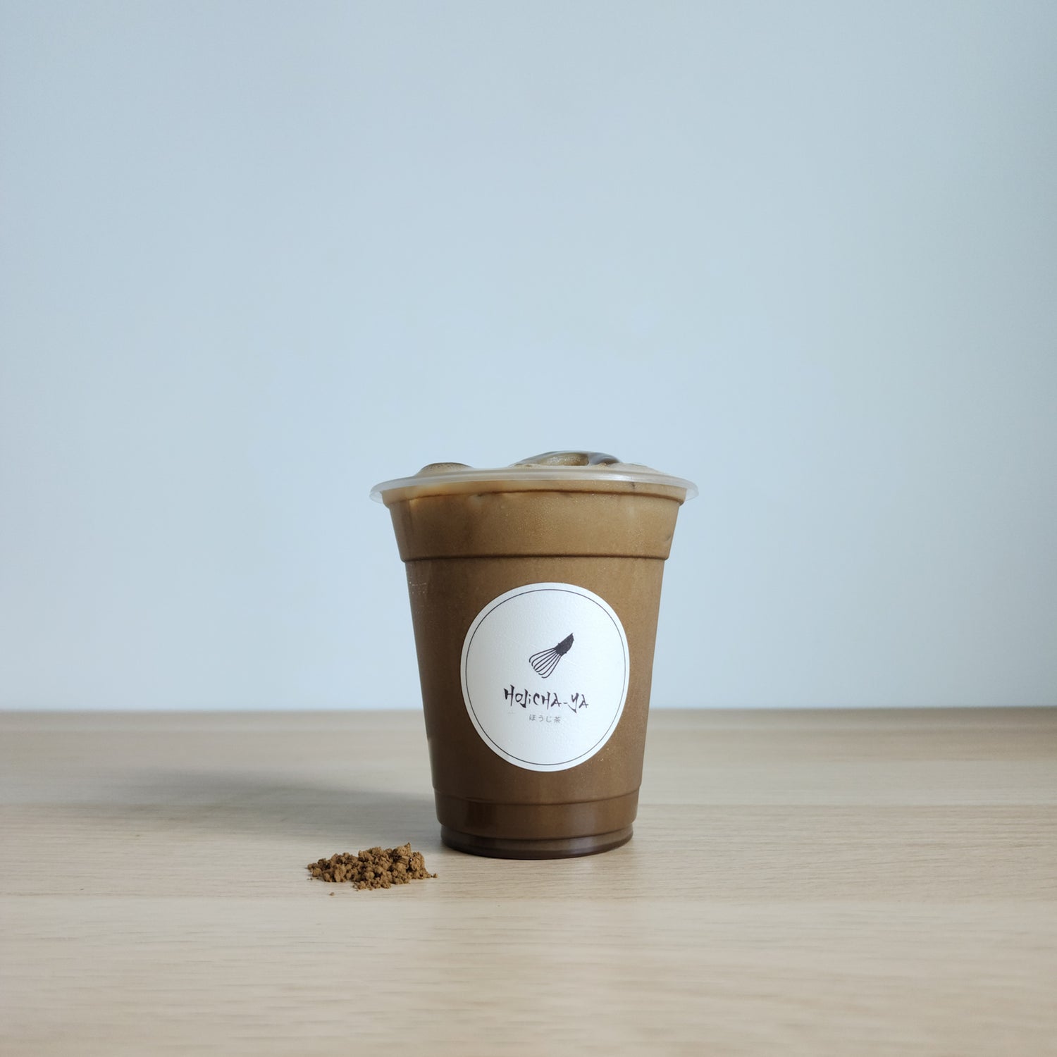 Refreshing ice Hojicha Latte, crafted with premium Japanese Hojicha tea powder available in Malaysia