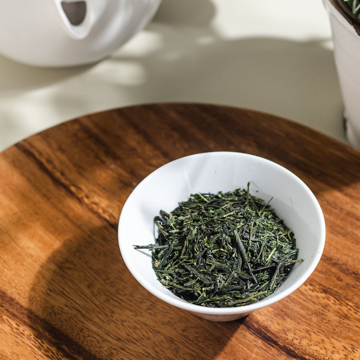 Premium Japanese Sencha green loose leaf tea leaves with a crisp, refreshing aroma