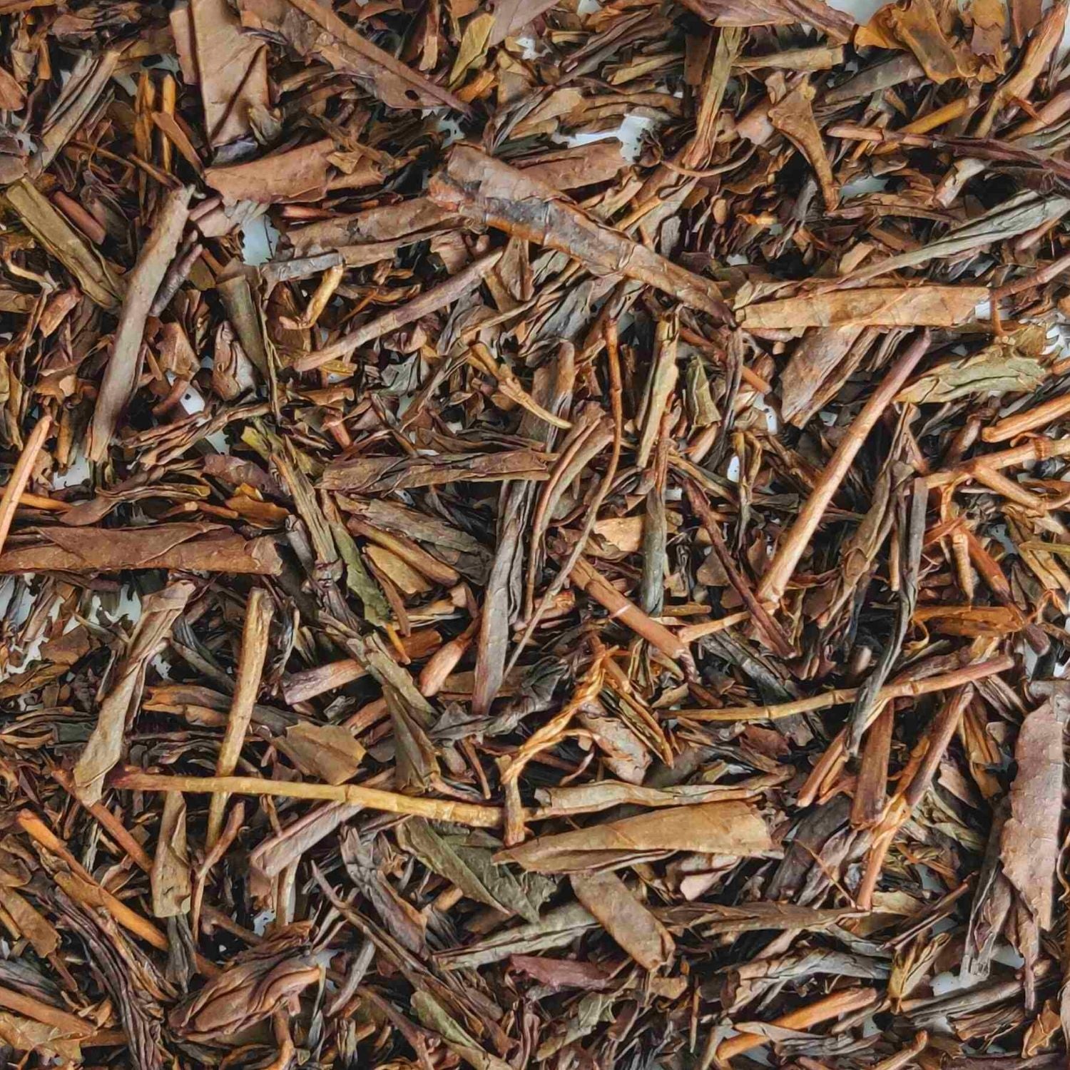 Luxurious brown Hojicha loose leaf tea with an earthy aroma, a must-try for authentic tea experiences