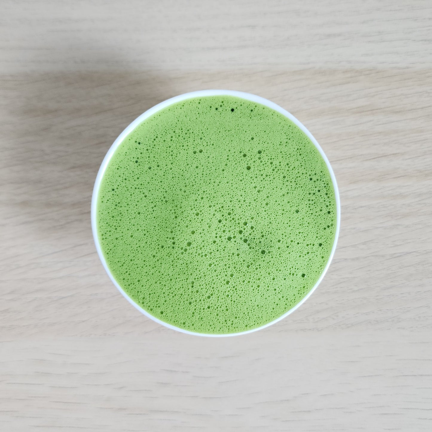 Perfectly whisked Japanese green tea powder creates a frothy, vibrant matcha in Malaysia
